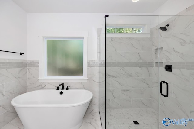 60 Trail Loop Rd, Huntsville, AL 35803 - full bath with marble finish flooring, a freestanding bath, a stall shower, tile walls, and a wainscoted wall