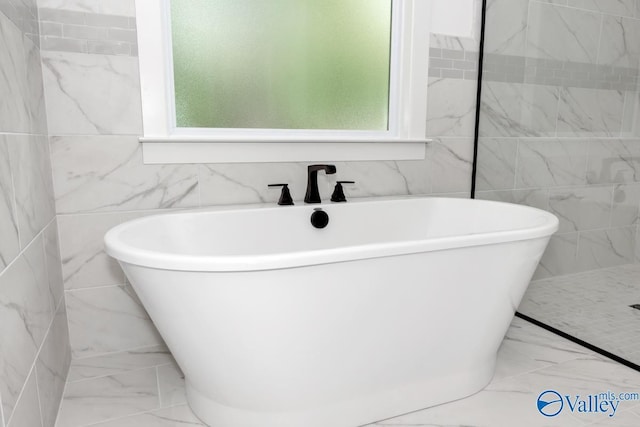 60 Trail Loop Rd, Huntsville, AL 35803 - full bath featuring marble finish floors, tile walls, and a freestanding bath
