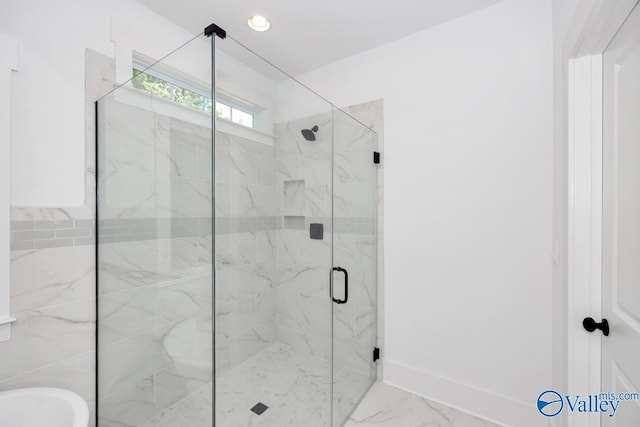 60 Trail Loop Rd, Huntsville, AL 35803 - bathroom featuring a marble finish shower, marble look tile flooring, a soaking tub, and recessed lighting
