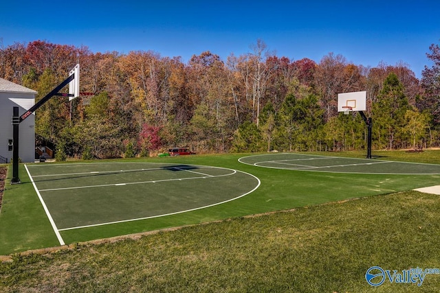 60 Trail Loop Rd, Huntsville, AL 35803 - view of basketball court featuring community basketball court, a lawn, and a forest view