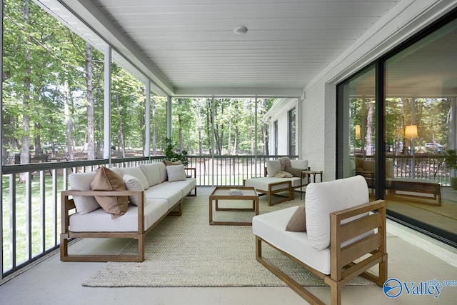60 Trail Loop Rd, Huntsville, AL 35803 - sunroom / solarium with an outdoor living space, healthy amount of natural light, and view of scattered trees