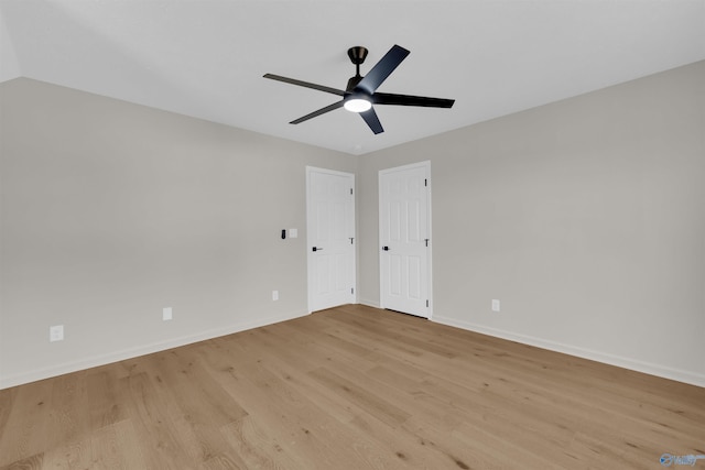 unfurnished room featuring ceiling fan and light wood-type flooring