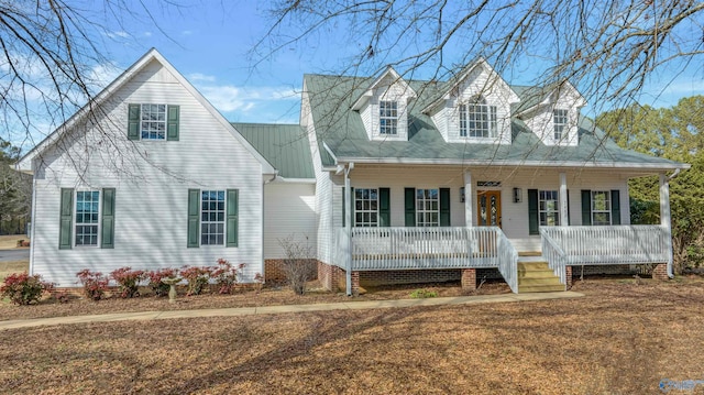 cape cod home with covered porch