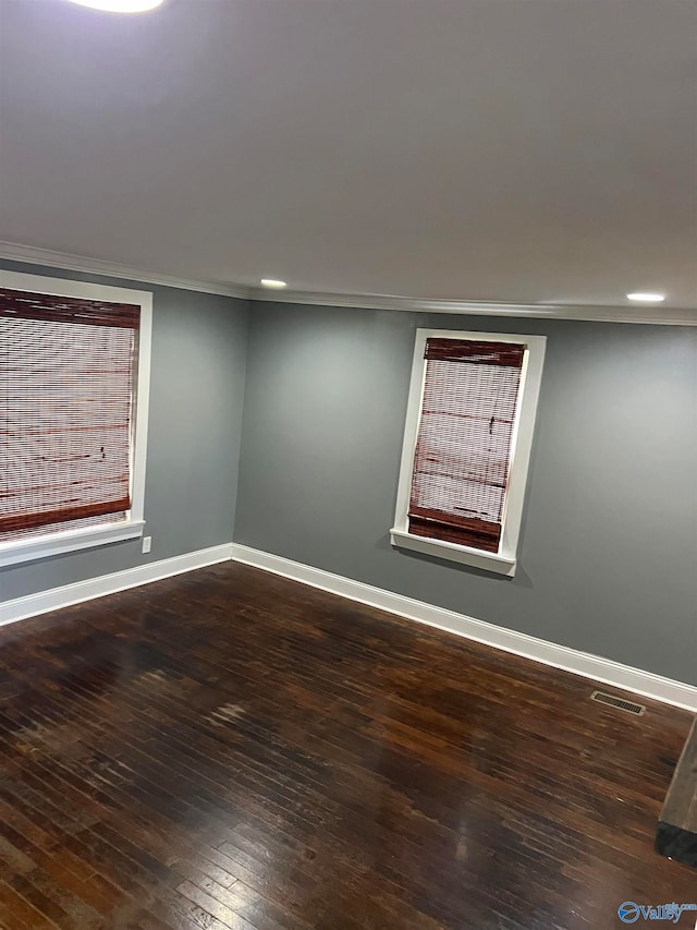 empty room featuring hardwood / wood-style flooring