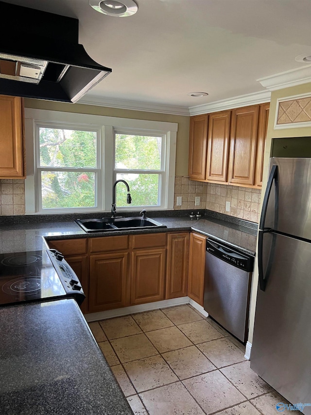 kitchen featuring ventilation hood, appliances with stainless steel finishes, tasteful backsplash, ornamental molding, and sink