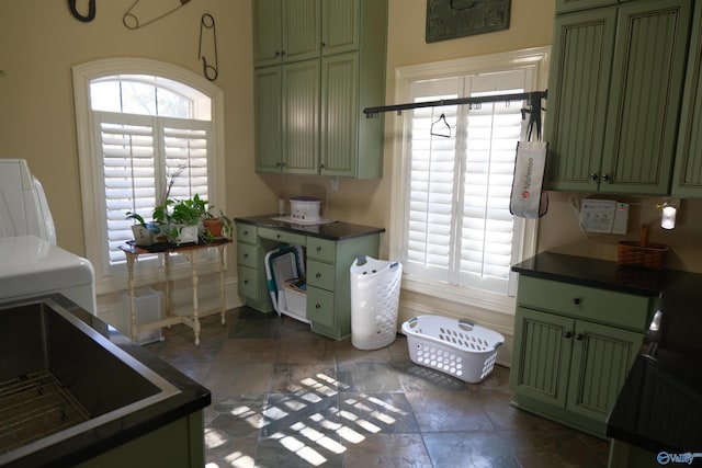 kitchen with green cabinetry