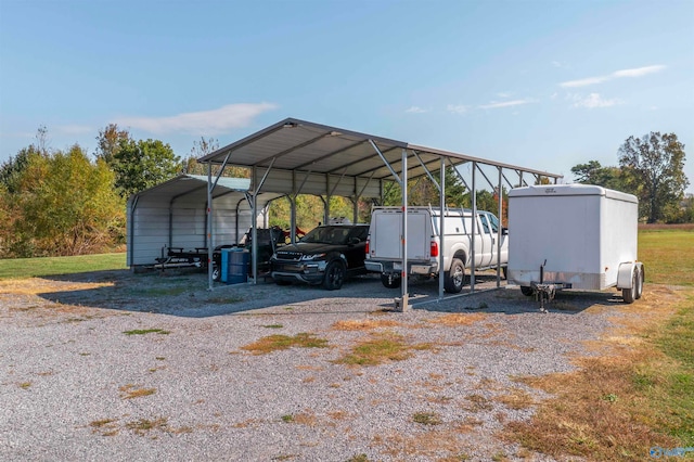 view of parking / parking lot featuring a carport