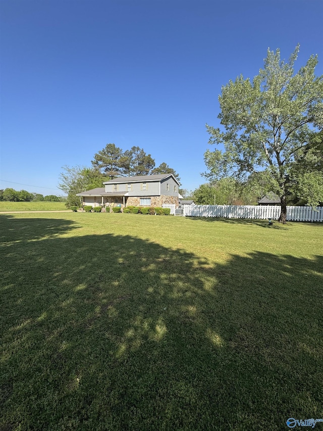 view of yard featuring fence