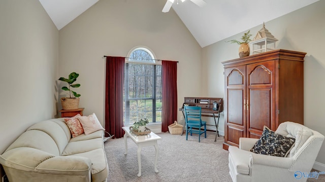 interior space featuring carpet flooring, a healthy amount of sunlight, high vaulted ceiling, and ceiling fan