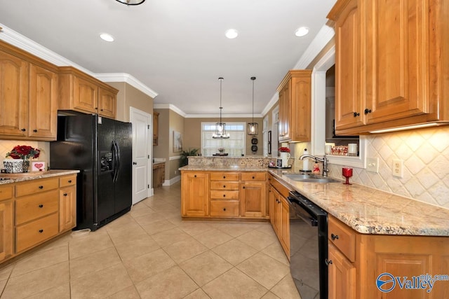 kitchen featuring sink, crown molding, black appliances, kitchen peninsula, and hanging light fixtures