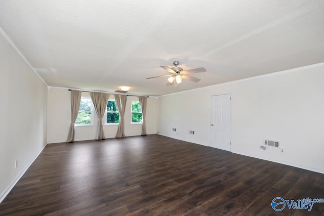 2614 Vista Dr SE, Huntsville, AL 35803 - spare room with a ceiling fan, dark wood-style flooring, crown molding, and baseboards