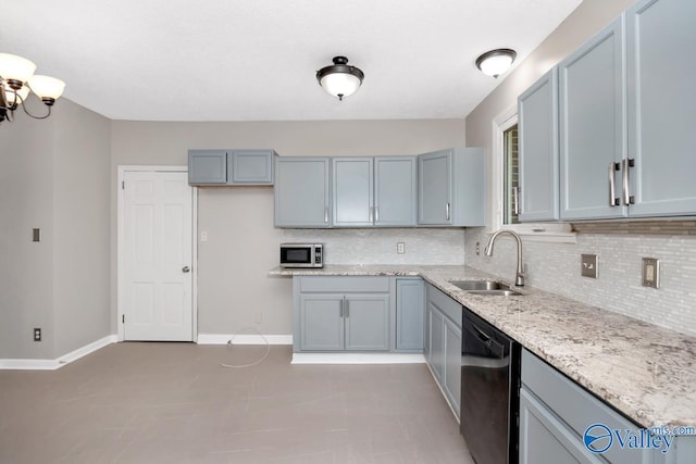 2614 Vista Dr SE, Huntsville, AL 35803 - kitchen with dishwashing machine, a sink, stainless steel microwave, and decorative backsplash