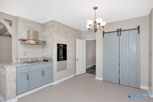 2614 Vista Dr SE, Huntsville, AL 35803 - kitchen with black appliances, wall chimney exhaust hood, a chandelier, baseboards, and decorative light fixtures