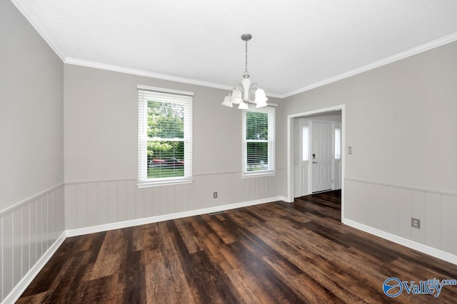2614 Vista Dr SE, Huntsville, AL 35803 - unfurnished dining area featuring a chandelier, dark wood-type flooring, wainscoting, and crown molding
