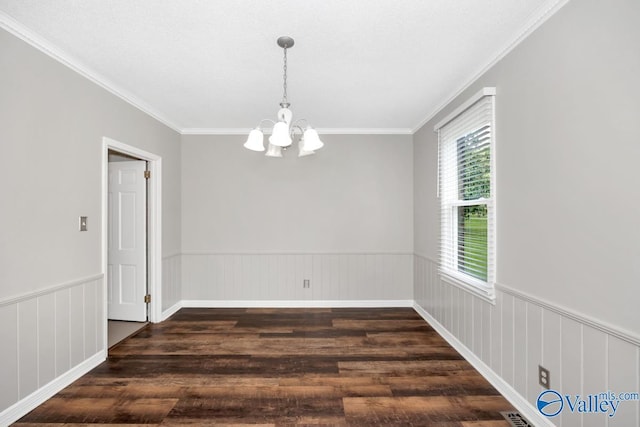 2614 Vista Dr SE, Huntsville, AL 35803 - empty room with a chandelier, wood finished floors, a wainscoted wall, and crown molding