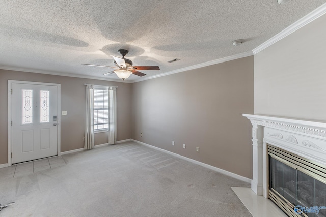 unfurnished living room with a fireplace with flush hearth, light colored carpet, crown molding, and visible vents