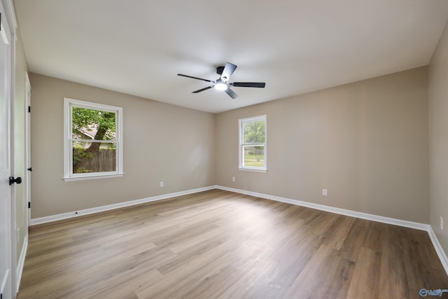 12034 Runningmeade Trl SE, Huntsville, AL 35803 - empty room featuring ceiling fan, light wood-style flooring, and baseboards