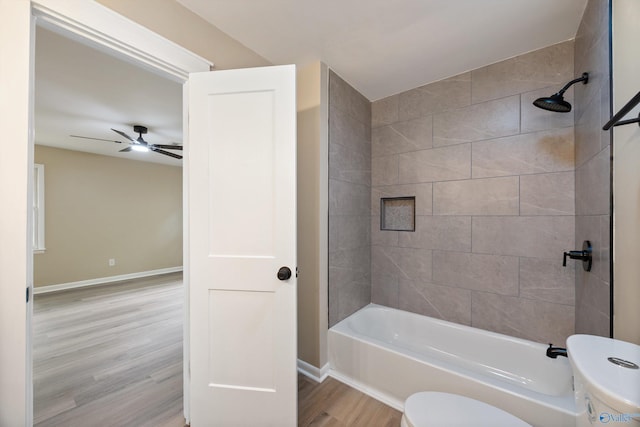 12034 Runningmeade Trl SE, Huntsville, AL 35803 - full bathroom featuring toilet, a ceiling fan, wood finished floors, shower / washtub combination, and baseboards