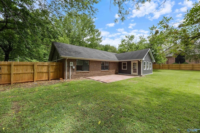 12034 Runningmeade Trl SE, Huntsville, AL 35803 - back of house with a patio area and brick siding