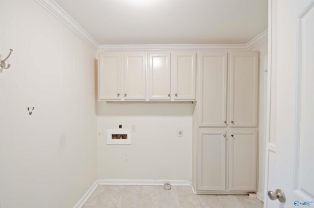 laundry room featuring hookup for a washing machine, ornamental molding, hookup for an electric dryer, gas dryer hookup, and cabinets