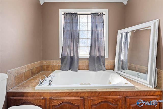 bathroom featuring a bathtub and toilet