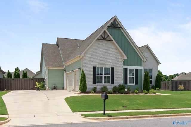 6320 Loring Loop NW, Huntsville, AL 35806 - craftsman-style house featuring board and batten siding, driveway, a garage, and brick siding
