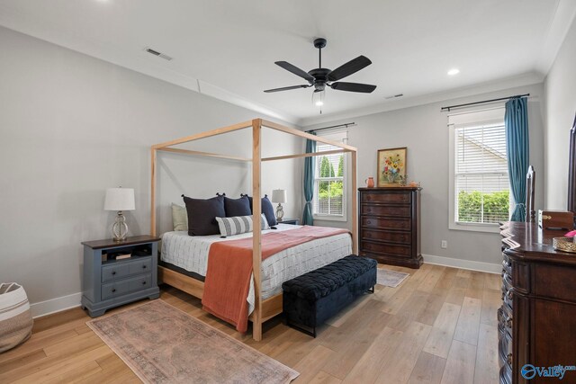 6320 Loring Loop NW, Huntsville, AL 35806 - bedroom featuring multiple windows, light wood finished floors, recessed lighting, a ceiling fan, and crown molding