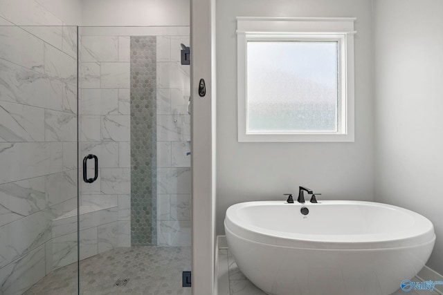 6320 Loring Loop NW, Huntsville, AL 35806 - bathroom featuring a freestanding bath and a stall shower