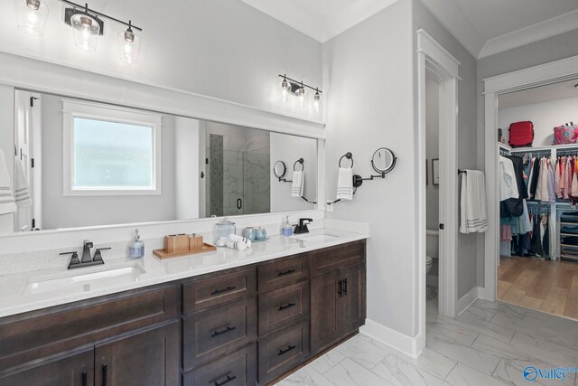 6320 Loring Loop NW, Huntsville, AL 35806 - bathroom with marble finish flooring, a shower stall, double vanity, and a spacious closet