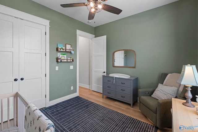 6320 Loring Loop NW, Huntsville, AL 35806 - bedroom with light wood-style floors, a closet, and a ceiling fan