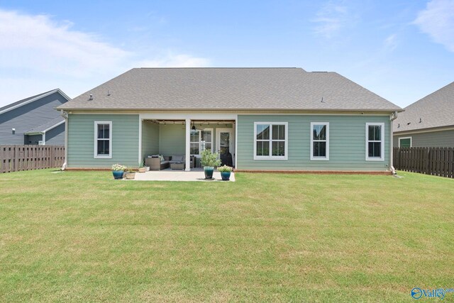 6320 Loring Loop NW, Huntsville, AL 35806 - rear view of property featuring a fenced backyard, a patio, ceiling fan, and an outdoor hangout area