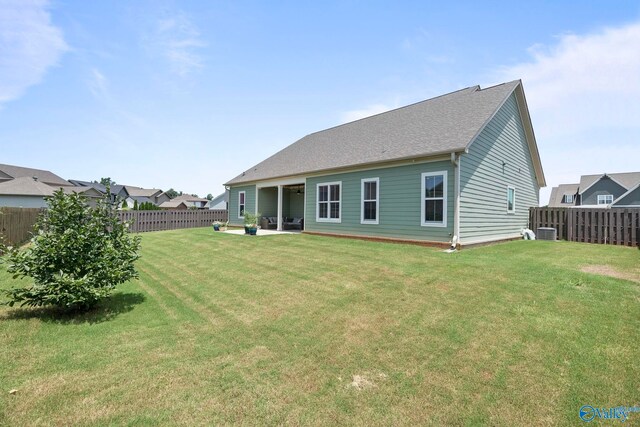 6320 Loring Loop NW, Huntsville, AL 35806 - rear view of property with a fenced backyard and a patio area