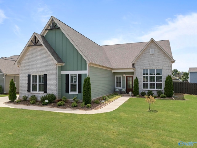 6320 Loring Loop NW, Huntsville, AL 35806 - craftsman inspired home with board and batten siding, a shingled roof, and brick siding