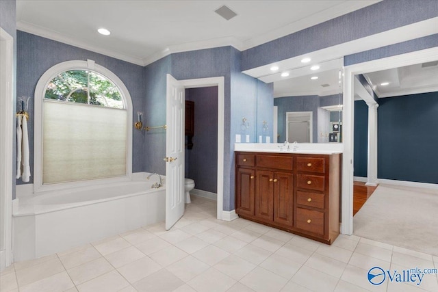 bathroom featuring toilet, ornate columns, crown molding, vanity, and tile patterned flooring