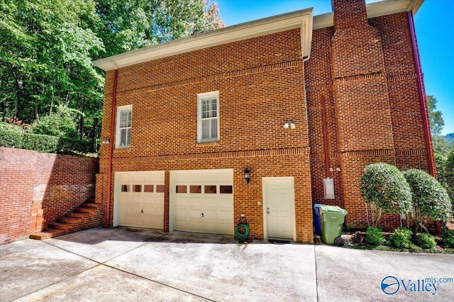 exterior space featuring a garage