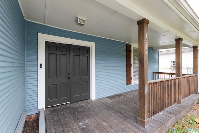 entrance to property with covered porch