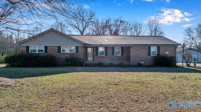 ranch-style house with a front yard, brick siding, and metal roof