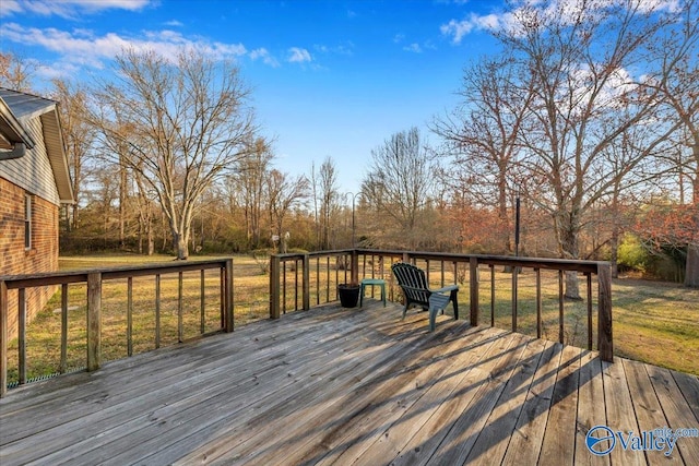 wooden deck with a yard