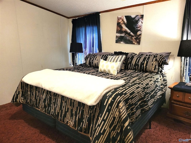 bedroom featuring crown molding, a textured ceiling, and dark colored carpet