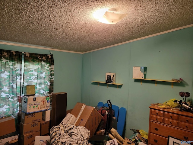 bedroom with ornamental molding and a textured ceiling