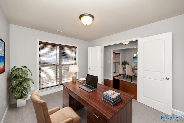 view of carpeted office space