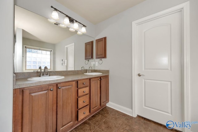 bathroom featuring vanity and tile patterned floors