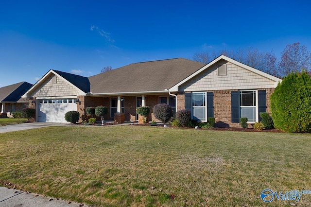 ranch-style home with a front yard and a garage