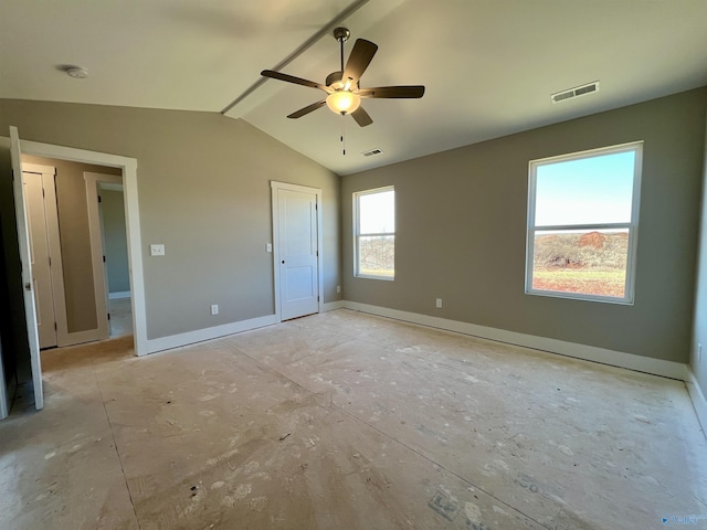 unfurnished bedroom featuring vaulted ceiling, ceiling fan, visible vents, and baseboards