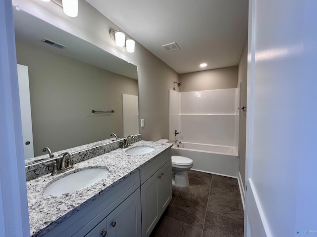 full bath with toilet, a sink, and visible vents