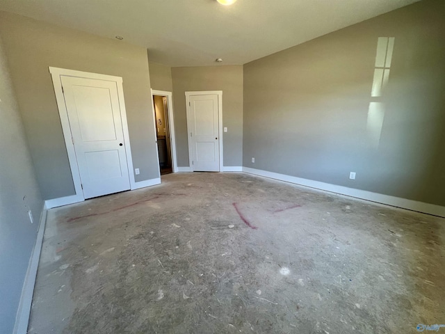 unfurnished bedroom with baseboards