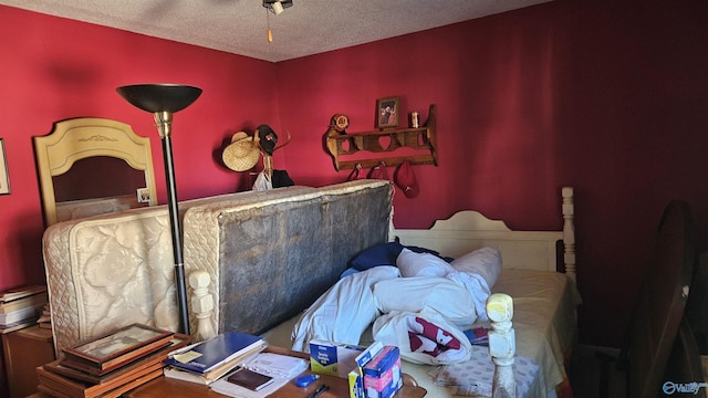 bedroom featuring a textured ceiling