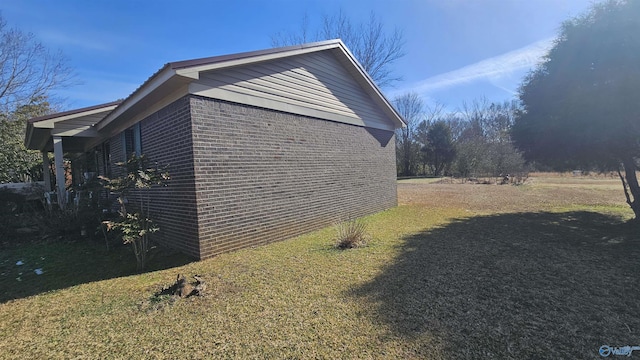 view of property exterior featuring a yard