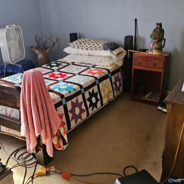 bedroom featuring dark colored carpet