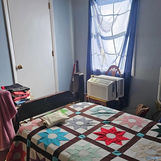 bedroom featuring cooling unit